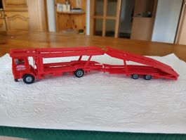 MAN Autotransporter 2-a 2-a rot Ladung 8 BMW Cabrio`s
